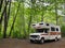 Recreational Vehicle Camping in Lush Green Forest