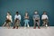 Recruitment, phone and laptop chair row of people at workspace corridor waiting with mockup. Company interview queue