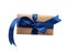 Rectangle box wrapped in brown kraft paper and tied with a silk blue ribbon, top view