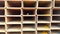 Rectangle Steel Tube in rows. Rectangular rusty pipe background. Hot and cold rolled metal Tubing. Industrial metal supply. Wareho