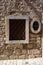 Rectangular and oval shape window with stone frame in Rovinj, Cr