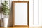 Rectangular picture frame mockup with wooden subframe on light wooden floor