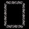 Rectangular plant frame shiny silver color. The lush, ornate on a dark background.