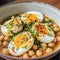On a rectangular plate of Spanish - style boiled eggs with chickpeas on the table