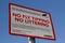 Rectangular sign warning of CCTV and the danger of fly tipping and littering Wirral Merseyside July 2013