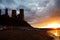 Reculver Towers at sunset .