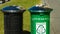Recyclable bin and a trash bin side by side