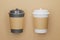 Recyclable cardboard cups. Black and white paper cup mockup with closed lids for your design. Glasses on the background of craft