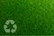 Recyclable Symbol a green grass background