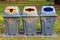 Recycle bins at public park. Public garbage bins.