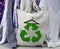Recycle clothes symbol on reusable fabric bag