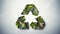 Recycle sign on blurred background.Close up of green triangular eco sign.