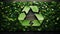 Recycle sign on blurred background.Close up of green triangular eco sign.