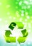 Recycle Symbol on Abstract Lens Flare Background