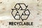 Recycle symbol on wood planks. Save the planet.