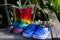 Recycled childrens boots and shoes in garden used as plant pots