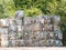 Recycled paper factory. Bales of cardboard, boxes and papers prepared to be recycled in a warehouse