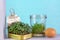 Recycled, reused sardine tin and jar to grow salad greens, with egg on sunny window ledge, fun way to grow your own food