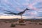 Recycled Roadrunner Sculpture at sunrise