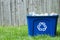 A recycling bin outside