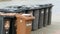 Recycling bins for residual waste and brown biotons standing on the road, Germany, Europe