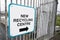 Recycling centre sign with direction arrow to recycle furniture and timber
