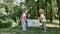 Recycling and Kids. Two cute little boy and girl holding recycle bin with plastic waste while standing in the forest or