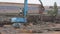 Recycling metal waste, metal recycling yard. Recycling of metal. Excavator with grab