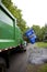 Recycling truck picking up bin - Vertical