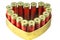 Red 12 caliber bullet shotgun shells in tin heart shape box. Gift for real man.