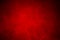 Red abstract background with dark vignetting. free space for your creativity