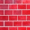Red abstract colored colorful brick tiles tilework glazed ceramic wall or floor texture wide background pattern