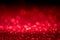 Red abstract light background blurred bokeh image defocused for festivals