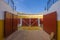 Red access doors to the bullring