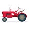 Red agricultural tractor on huge wheels for field works