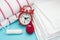 Red alarm clock, dreamy smile crochet blood drop, daily menstrual pad and tampon and terry towel. Menstruation sanitary woman hygi