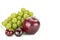 Red apple, cheeries, and a bunch of green grapes