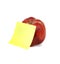 Red apple with clear yellow notepaper