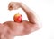 Red Apple on Man\'s Bicep Muscle