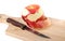 Red apple, peel and knife