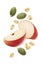 Red apple pieces, green pumpkin seeds and rolled oats isolated on white background. Cereal ingredients
