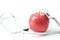A red apple and stethoscope