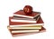 Red Apple on top of pile of Seven Books