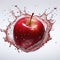 Red apple on white background. Apple in a splash of juice with drops. Apple juice. Fresh food. Splash of juice.