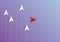 Red arrow change direction from group on purple background as metaphor for business creativity new idea.