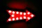 Red arrow: red vintage bright and colorful illuminated display arrow sign