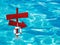 Red arrow sign in swimming pool