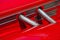 Red automobile exhaust system componen-corrugated