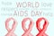 Red awareness ribbons and text world aids day