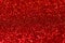 Red background with shimmering glitter